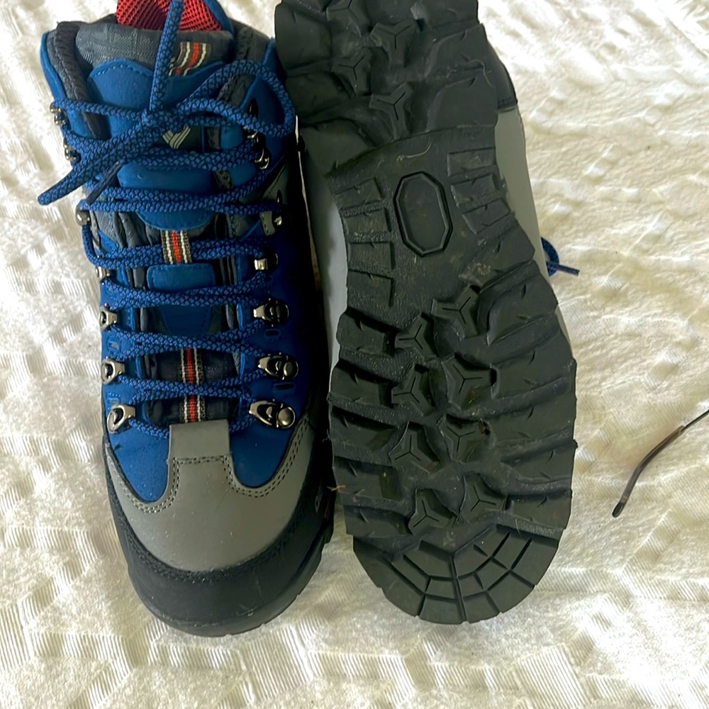 100% water proof, durable, light weight. Reinforced toe. Rugged out sole.